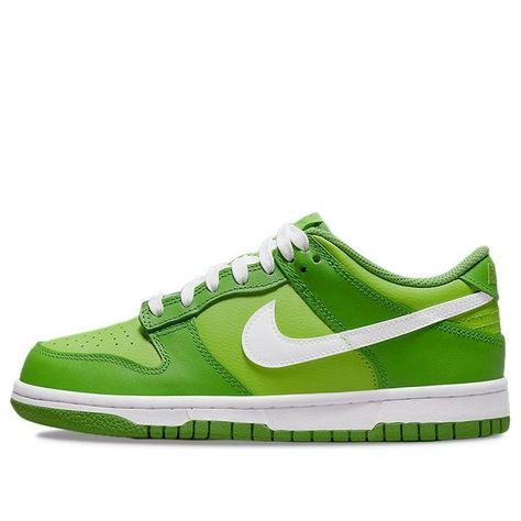 The Nike Dunk Low GS 'Chlorophyll' is designed for the most discerning grade schoolers who want to turn heads and proudly represent the Nike brand. The bright green color adds a vivid splash of fun, while white adds contrast and a softer touch. This dynamic look follows through even in the details––the laces, white midsole, side Swoosh, and embroidered branding are all done in a complementary chlorophyll green shade. And with perforated toe boxes to keep little feet cool and dry without sacrific Nike Dunk Low Chlorophyll, Nike Models, Nike Brand, Nike Dunk Low, Low Top Sneakers, White Brand, Dunk Low, Nike Sneakers, Designer Sneakers