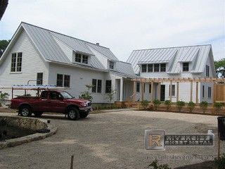 Metal Roofing - Dove grey color-love the wings, would add 2 more, in pinwheel design to accommodate live-in parents & kids home from college/guests...could have vaction rental promise later in years. Metal Roof Houses Color Combos, Grey Metal Roof, Gray Metal Roof, Exterior Siding Colors, Metal Roof Houses, Standing Seam Metal Roof, Barn Kitchen, Fibreglass Roof, Siding Colors