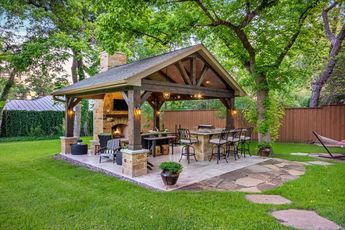 This freestanding covered patio with an outdoor kitchen and fireplace is the perfect retreat from the constraints of the house.  The homeowner had an existing structure located in their back yard that we demolished and built them this beautiful new space. Outdoor Kitchen Decor, Rustic Patio, Outdoor Kitchen Bars, Grill Area, Outdoor Patio Designs, Outdoor Pavilion, Backyard Pavilion, Cozy Outdoor, 카페 인테리어 디자인