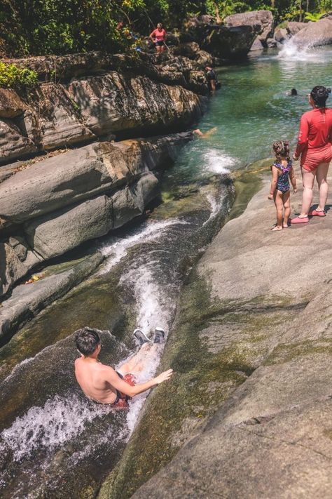 7 Things to do in El Yunque National Forest (With Photos) | Las Paylas Natural Waterslides #simplywander El Yunque Rainforest Outfit, Natural Water Slide, El Yunque Rainforest, El Yunque National Forest, Puerto Rico Trip, Puerto Rico Vacation, Jungle House, Porto Rico, Swimming Holes