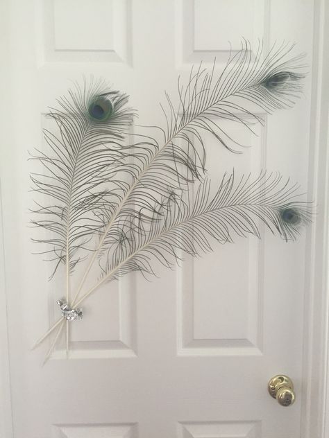 Decorative wall piece made from real peacock feathers Peacock Feathers Decorations Home Decor, Peacock Feather Wall Decor, Peacock Room Decor, Peacock Feather Decor, Peacock Room, Baby Boy Decorations, Esthetician Room Decor, Feather Wall Decor, Girly Room Decor