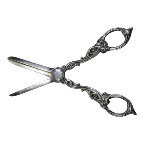 A Very Nice Pretty Pair of Antique - Victorian Sheffield Silver Plate Grape Shears. Circa Late 1800s. These shears feature heavy solid cast metal handles that feature a classic Floral & Rams Head motif. These would have been used on a formal dining table to cut grape clusters into individual servings. Circa Late 1800s. They are in Very Good Cosmetic and Usable Condition. They Measures 7 inches Long x 2 1/8 inches Wide x 3/4 inch Tall.  PLEASE NOTE! That With The Majority Of My Items I Will B Formal Dining Table, Pickers Antiques, Victorian Men, Rams Head, Vintage Scissors, Pewter Jewelry, Real Bodies, Antique Sewing Machines, Formal Dining Tables