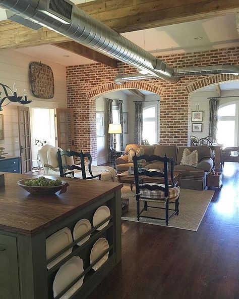 Farmhouse Family Rooms, Barndominium Interior, Industrial Farmhouse Decor, Exposed Brick Walls, Brick Walls, Industrial Farmhouse, High Ceilings, Exposed Brick, Wood Flooring