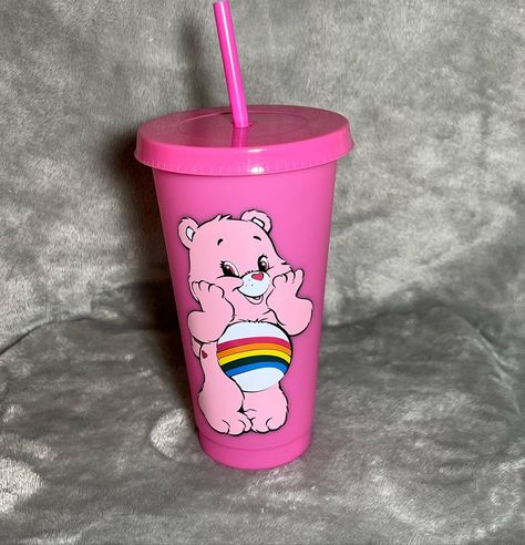 Care Bears color changing cold cups with straw and lid. The bears available are Cheer Bear, Friend Bear, Sunshine Bear, Good Luck Bear, Grumpy Bear, and Share Bear. Send a message to inquire about other bears. Care Bear Merch, Care Bears Care A Lot, Care Bear Collection, Care Bears Tumbler Cup, Care Bear Mug, Sunshine Bear, Banana Roll, Care Bear Birthday, Pink Teddy Bear