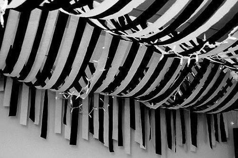 Streamer Decorations Ceiling, Emo Night Party Decorations, Halloween Streamers Decorations, Ceiling Halloween Decorations, Halloween Streamer Ideas, Beetlejuice Office Decorations, Wednesday Party Decor, Halloween Ceiling Decor, Halloween Ceiling Decorations