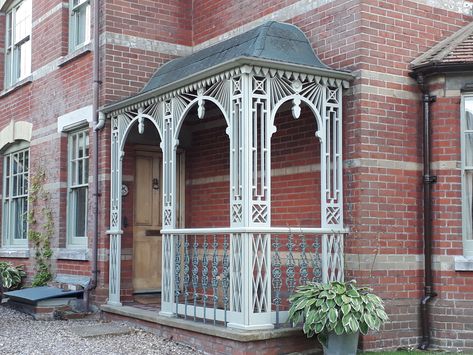 Victorian or Edwardian storm porch Edwardian Front Door Porch, Edwardian Porch, Victorian Awning, Victorian Porch Ideas, Storm Porch, Brewery Patio, Edwardian House Exterior, Metal Door Canopy, Victorian Porches