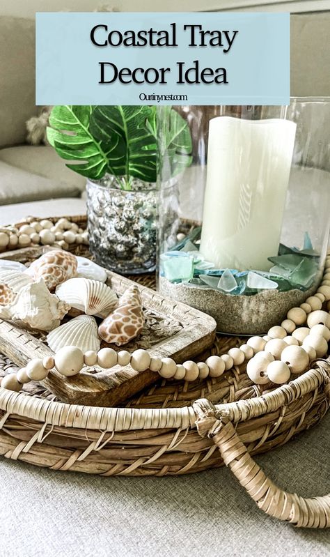 Summer vignette or tray decor idea for coastal beach decor Coffee Table Coastal Decor, Coastal Kitchen Island Decor, Coastal Tray Decor Ideas, Summer Decor Living Room, Summer Tray Decor Ideas, Coastal Coffee Table Decor Ideas, Neutral Beach Decor, Coastal Table Centerpiece, Dark Coastal Decor