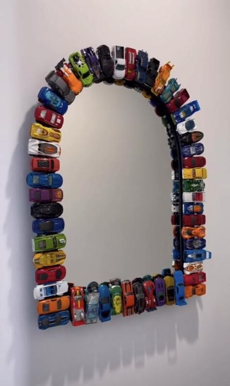 DIYer Turns Hot Wheels Car Collection Into a Stunning Piece of Functional Home Decor - NewsBreak Hot Wheel Mirror, Hot Wheel Crafts, Hot Wheels Nursery, Hot Wheels Decor, Hot Wheels Mirror, Hot Wheels Crafts, Bf Crafts, Christmas Car Decor, Hot Wheels Bedroom