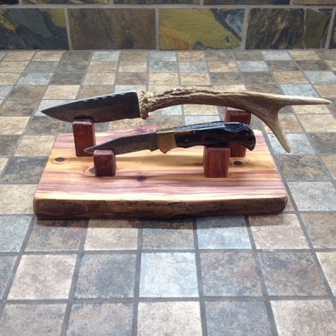 Unique, rustic, handcrafted, live edge, cedar knife display.  Get out your special knives from where no one can see them and make it a conversation piece on display, use it in the kitchen everyday, or give as the perfect gift. This solid cedar knife holder will show case your knives with it's natural live edge on both sides and beautiful grain. Wooden dowel rods have been inserted and glued in drilled holes in the base along with the holders for the knives to insure they will not come off over t Knife Display Ideas, Rustic Knife, Pocket Knife Display, Knife Display, Unique Knife, Knife Blocks, Knife Stand, Wood Knife, Furniture Polish