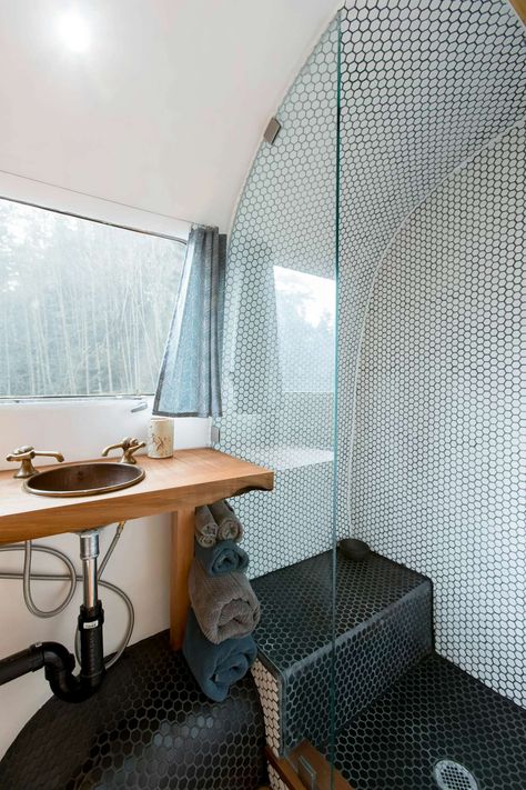 Photo 35 of 46 in 26 Vintage Airstream Renovations That’ll Make You Want to Hop on the Bandwagon - Dwell Rv Bathrooms, Airstream Bathroom, Airstream Living, Airstream Travel Trailers, Airstream Remodel, Airstream Interior, Airstream Renovation, Hexagon Mosaic Tile, Mobile Home Living