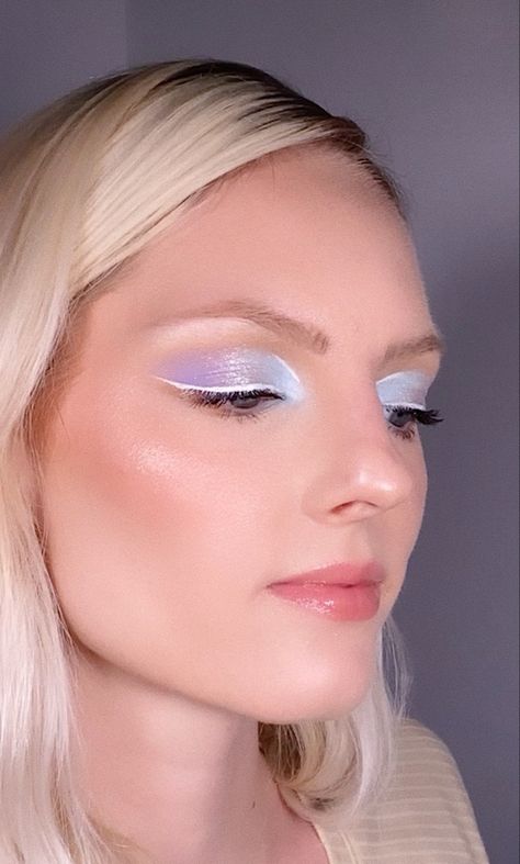 Lavender, silver & baby blue eyeshadow w/ white graphic liner, glowy skin, glossy lips #makeupartist #mua #makeup #springmakeup #pastelmakeup #makeuptutorial #whiteliner #graphicliner #patmcgrath #colourpopcosmetics #nars #maccosmetics #kkwbeauty #graphicmakeup #edgymakeup #pastelaesthetic Lavender Makeup Aesthetic, Lilac Eye Makeup Lavender, Lavender Haze Makeup, Baby Blue Eyeshadow, Lavender Graphic Liner, Lilac Glitter Eyeshadow, Spring Makeup Tutorial, Pastel Makeup, White Eyeshadow