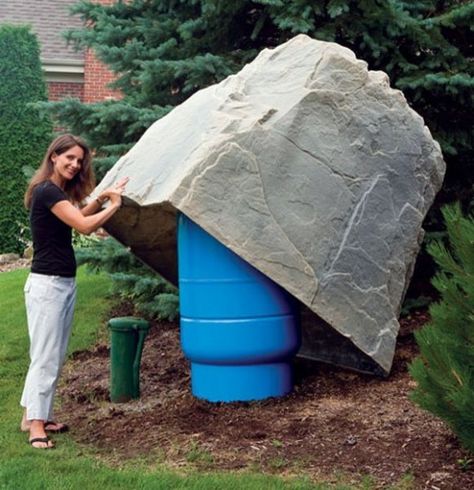 Now this is a big fake rock!  You could hide a king sized geocache here. Fake Rock Covers, Well Pressure Tank, Pool Equipment Cover, Well Covers, Well House, Artificial Rocks, Well Cover, Fake Rock, Faux Rock