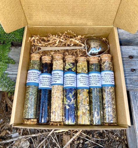 7 organic caffeine free herbal tisane/teas in glass tubes with cork lids (sealed for freshness and safety). Made fresh to order sampler tea gift box set with premium high quality organic, ethically sourced dried herbs, flowers, roots and berries. Also comes with a stainless steel heart shaped tea infuser. ~~Make individual teas or add and incorporate herbs from individual tubes to create and customize personal tea tastes and flavors.  All herbal teas included in set; butterfly pea flower, chamom Tea Shop Ideas, Herb Packaging, Herb Teas, Mullein Tea, Tea Sampler Gift, Tea Business, Flower Season, Wild Bunch, Tea Station