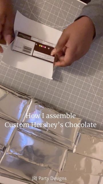 JRJ Party Designs on Instagram: "84 Custom Hershey’s Chocolate Brand Event I assemble Hershey’s Chocolate bars 2 different ways. This is one option #customchocolate #customchocolates #hersheys #hersheychocolate #papercrafts #papercrafting #makeupbrands #makeuptutorial #makeuplover #makeupreels #makeupgoals #makeupmusthaves #makeupfoundation #makeuptip #makeuptipsandtricks #customcandywrappers #customeventdesign #custompartyfavors #brandactivations #brandevent #brandevents #brandparty" Custom Chocolate Bars, Brand Event, Hershey Bar, Custom Party Favors, Custom Chocolate, Chocolate Brands, Hershey Chocolate, Makeup Must Haves, Candy Wrappers