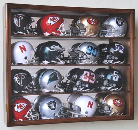 PRICES MAY VARY. Eye-Catching ~ Stunning mirrored back, fitting for all mini football helmet collectors. Quality ~ Handcrafted in solid, furniture-grade, beech hardwood with an elegant finish. Secure ~ Lockable brass latches to ensure the security of your collection. Protective ~ 98% UV protection acrylic door to safeguard your mini helmets from fading. Ready-to-Use ~ Fully assembled, with wall mounting hardware included. Outside Dimensions: 24"H X 27.5"W X 6.25"D Inside Dimensions: 23"H x 26.5" Helmet Display, Mini Football Helmet, Cabinet Mirror, Mini Liquor Bottles, Mini Footballs, Hardwood Doors, Cabinet Wall, Bottle Display, Sports Room