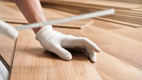 Can You Seal the Seams of Laminate Flooring? | Hunker Baseboard Molding, Silicone Caulk, Bathroom Installation, Ceramic Floor Tiles, Carpet Installation, Tongue And Groove, Baseboards, Laminate Flooring, The Gap