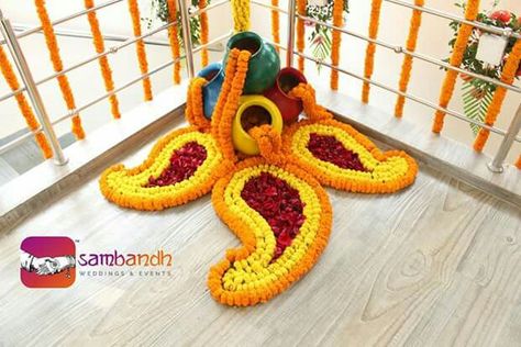 Matka decoration with flower  mehendi Matka Rangoli Designs, Matka Decoration For Diwali, Housewarming Decorations Diy, Simple Flower Decoration, Matka Decoration, Rangoli Designs With Flowers, Rangoli With Flowers, Flower Mehendi, Diwali Decorations At Home