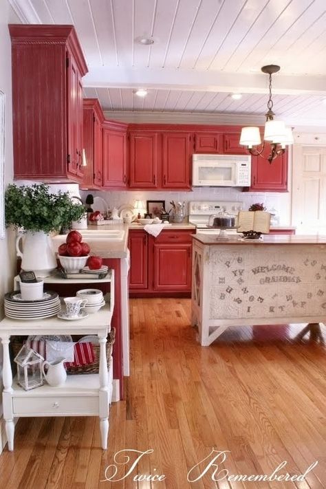 …that became a glamorous red country kitchen with shiplap ceilings and wood floors. | 19 Unbelievable Real-Life Kitchen Transformations Kitchen Vignettes, Red Cabinets, Rustic Kitchen Cabinets, Country Kitchens, Red Cottage, Decor Ikea, Red Kitchen, Farmhouse Style Kitchen, Kitchen Redo