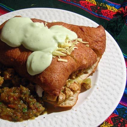 Stuffed Sopapillas. Yummmmm. Why don't any of the Mexican/Southwest restaurants around here make these? Stuffed Sopapillas, Fry Bread, Big Guy, Flagstaff, How To Make Bread, Burritos, Deep Fried, New Mexico, Flour