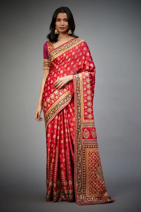 Red silk satin saree with floral embroidered and printed motifs in aari work. Comes with unstitched blouse. Component: 2 Pattern: Printed,Embroidered Type Of Work: Aari Work Fabric: Silk Satin Color: Red Other Details:  Floral motifs Note: Blouse worn by the model is not for sale Occasion: Wedding, Bride - Aza Fashions Aari Work Saree, Saree Gowns, Cotton Sarees Handloom, Ritu Kumar, Ruffle Saree, Satin Saree, Geometric Fabric, Red Saree, Lehenga Saree