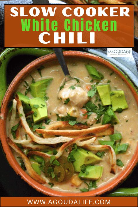 Easy Slow Cooker White Chicken Chili - packed with shredded chicken, white beans and bold flavor in a creamy broth. The perfect meal on busy weeknights - great for chili cook offs, tailgating or any fall gathering! #whitechickenchili #slowcookerrecipe #slowcookerwhitechickenchili #whitechlili #bestwhitechickenchili #weeknightmeal #bestchilirecipe #bestwhitechili #agoudalife White Chilli, Slow Cooker White Chicken Chili, White Chicken Chili Slow Cooker, White Chili, Best Chili Recipe, Chilli Chicken, Fall Gathering, Best Slow Cooker, White Chicken Chili