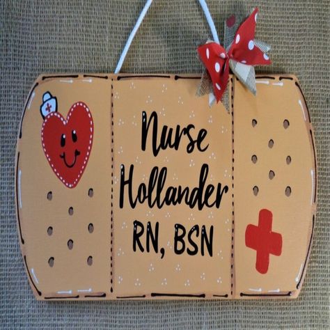 Add a personal touch to your classroom or nurse office with our handcrafted personalized wood signs! Choose from bandage or round shape for your NURSE name sign, or get our 15" apple or nurse cap wall hangers. Perfect for school nursing staff or as a thoughtful gift. #personalized #handcrafted #nursesign #classroomdecor #nurseoffice#MillerFamilyWoodcrafts# #CustomMade #SCHOOLNURSESIGN #Wood #eBaySeller #eBayStore #eBay #Names Nurse Signs, Doctor Sign, Classroom Door Signs, School Health, Nurse Office, Personalized Wood Signs, Teacher Signs, Nurse Appreciation Gifts, Care Worker