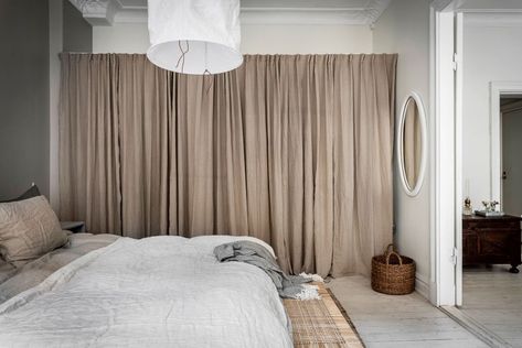 Curtains to hide open storage | Seven interesting ways to use curtains | These Four Walls blog Curtain Wardrobe Doors, Curtain Wardrobe, Moveable Wall, White Linen Curtains, Closet Curtains, Open Wardrobe, Room Divider Curtain, Dressing Rooms, Grey Bedroom