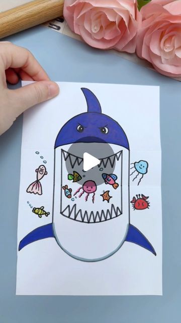 paper crafts creator on Instagram: "Title: "Big Shark Adventure: Easy Folding Painting for Kids!"

Hashtags:
- #SharkSimplePainting
- #SharkChildrensPainting
- #ChildrensPainting
- #DrawIfYouWant
- #ParentChildCrafts
- #CreativeKidsArt" Easy Shark Crafts For Kids, Easy Drawings For Kids Cute, Cute Shark Doodle, Drawing For Kids Easy Children, Sea Animals Activities, Cute Sea Animals Drawing, Paper Folding Crafts For Kids, Drawing Ideas Easy For Kids, 2024 Title