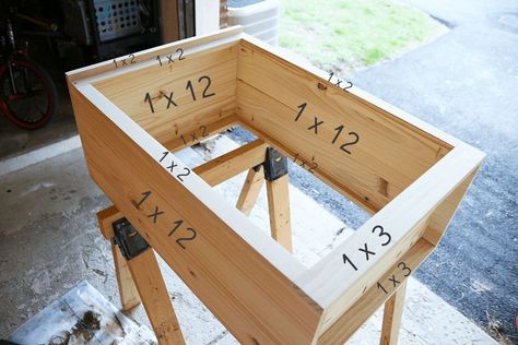 How to Make a Custom Tilt-out Trash Cabinet | JustAGirlAndHerBlog.com How To Build A Trash Can Cabinet, Wood Trash Can Holder, Wooden Trash Can Holder, Pallet Pantry, Wooden Trash Can, Wood Trash Can, Garbage Can Storage, Trash Cabinet, Trash Can Cabinet