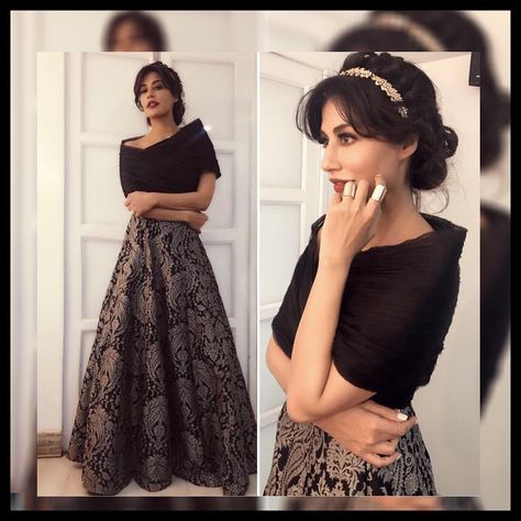 @iamchitrangda looks nothing less than a princess in a noir ensemble from JADE Couture with a bold lip and bejeweled hair accessory. The noir brocade lehenga with paisley is a timeless pick for the any woman's wardrobe and is paired with a finely pleated organza wrap that lends a royal touch to the look. Styled by: laksmilhr  To shop the look, reach us on Mumbai +91 9833115000 | Hyderabad +91 9848555585. We ship Internationally. Crop Top Outfits Indian, Bejeweled Hair, Jade Couture, Floral Maxi Dresses, Bridal Lehenga Online, Stylish Maxi Dress, Lehenga Designs Simple, Bold Lip, Frock Fashion