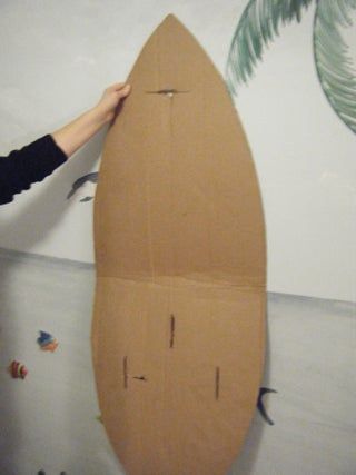 Carlos, the Corrugated Cardboard Surfboard: : 6 Steps - Instructables Cardboard Surfboard, Diy Surfboard Decor, Cardboard Costume, Surfboard Decor, Surfboard Shapes, Luau Theme Party, Hawaiian Birthday Party, Hawaiian Birthday, Birthday Party Decorations Diy