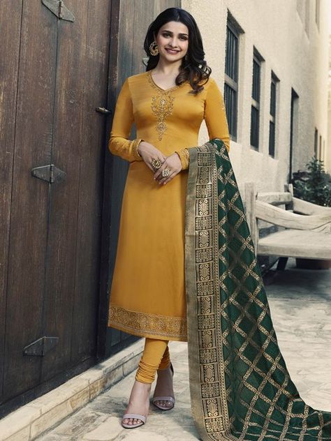 Yellow designer straight cut suit online which is crafted from satin georgette fabric with exclusive embroidery and stone work. This latest embroidered straight cut suit comes with santoon bottom and banarasi silk dupatta. Kurti Trends, Suit With Dupatta, Prachi Desai, Banarasi Dupatta, Punjabi Dress, Fancy Kurti, Designer Suit, Kurti Designs Party Wear, Indian Designer Outfits