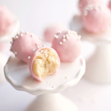 These Sugar Cookie Truffles are made of delicious and chewy sugar cookies mixed with cream cheese and dipped in chocolate. Spring Truffles, Pink Truffles, Princess Treats, Sugar Cookie Truffles, Pillsbury Sugar Cookie Dough, Pink Baking, Starbucks Cake Pops, Empire Cookie, Pillsbury Sugar Cookies