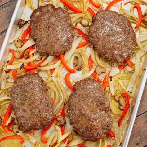 Oven Baked Hamburger Steaks are an easy sheet pan dinner recipe with seasoned ground beef patties cooked along with sliced onions, red bell peppers and mushrooms. Sheet Pan Hamburgers With Onions, Baked Frozen Hamburger Patties, Oven Baked Hamburger Patties Ground Beef, Frozen Hamburger Patties In Oven, How Long To Bake Hamburger Patties In Oven, Hamburger Ideas, Hearty Pasta Recipes, Recipes Using Pasta, Baked Hamburgers