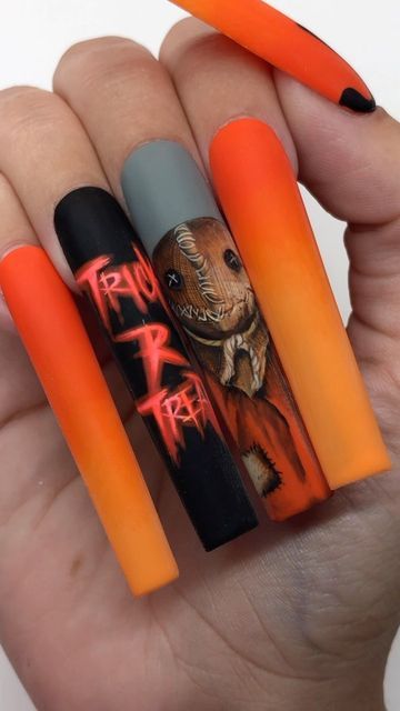 Trick Or Treat Nails, Trick R Treat Sam Nails, Sam Trick R Treat Nails, Trick R Treat Nails, Halloween Nails Based On Movies, Black Orange Nails Halloween, Halloween Orange And Black Nails, Matte Black And Orange Halloween Nails, Blue Nail Art Designs