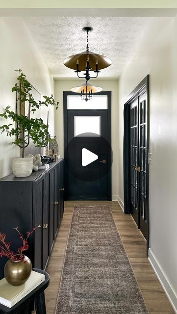 Emily Russo | Home Decor & Motherhood on Instagram: "POV you walk by my entry way. 🥰   You can’t tell me that these pendants lights from @homedepot weren’t meant to be here 🤩 and with a 79$ price tag (😱) it was a no brainer! This is a more narrow entryway and our primary entrance to the house so with five kiddos I needed a landing spot for all the STUFF we have and these Billy bookcases lined up made a perfect entryway storage solution!   Entry way styling | entry way upgrade | organic modern | moody interiors | interior decorating | interior styling | affordable home finds" Organic Modern Entry, Moody Entryway Ideas, Long Foyer Ideas Entryway, Narrow Entrance Hall Ideas, Hallway Entry Ideas, Long Narrow Entryway, Long Entry Hallway Ideas, Moody Entryway, Narrow Entryway Ideas