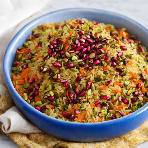 This jeweled rice recipe is a show-stopping dish. The combination of colours and textures paired with the fragrant aroma and complex flavours make this recipe a truly worthy dish for any special occasion. This Middle Eastern inspired rice dish is called jeweled rice due to the that resembles gems. A celebratory dish that is often […] The post Jeweled Rice appeared first on Scrumptiously. Rice With Gravy, Persian Jeweled Rice, Jeweled Rice, Rice Salad Recipes, Birthday Vibes, Rice Dish, Rice Salad, Persian Food, 25th Birthday