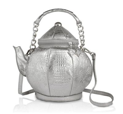 10 Crazy Unique Purses for Crazy Unique Fashionistas. Unusual handbags. Kitschy fashion, crazy fashion, eccentric fashion. Statement purses. Milk Carton Bag, Eccentric Fashion, Unusual Handbags, Funky Purses, Statement Purse, Novelty Handbags, Crazy Fashion, Silver Teapot, Unique Handbags