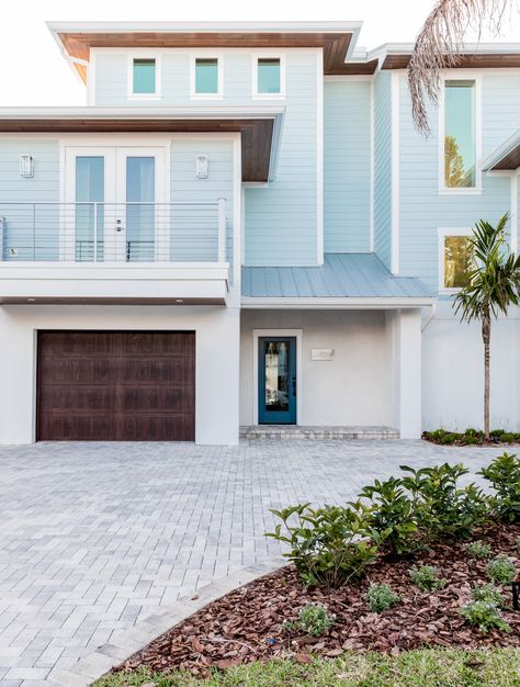 Welcome to Santorini Skies where the blues of the ocean and sky meet into a coastal modern paradise! This stunning new build on Anna Maria Island is the perfect example of how coastal living and high-end design can come together in a beautiful and practical way. Coastal Apartment Exterior, Modern Coastal Home Exterior, Coastal Home Exterior, Coastal Apartment, Galveston Beach, Modern Coastal Home, Apartment Exterior, Beach Bungalow, Save File