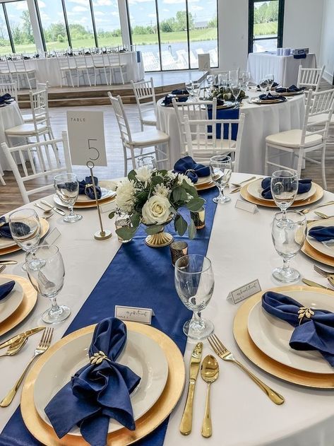 Navy Gold And Silver Wedding, Navy Blue And Gold Place Setting, Gold Navy Wedding Decor, Navy And Gold Banquet Decorations, Navy Blue And White Event Decor, Navy Gold And White Graduation Party, Navy Gold And White Wedding Decor, Wedding Table Settings Navy Blue, Navy Blue And Gold Wedding Table Setting