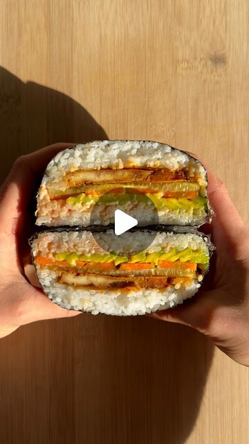 Ma’ayan | vegan, healthy & gluten free recipes on Instagram: "VEGAN ONIGIRAZU😮‍💨 // full recipe ↓ 

Japanese “sushi sandwich” aka onigirazu is gonna have you addicted after the first bite! 
It’s like sushi, but much easier to make andddd perfect for healthy meal prep🫡 I meannnn what’s not to like?😏

INGREDIENTS: (makes 3-4)
1 cup sushi rice
1 ¼ cups boiling water
2 tbsp rice vinegar
1 tbsp maple syrup
1 tsp sesame oil
1 tsp salt

250 g firm tofu
1-2 tsp gochujang
2 tbsp soy sauce
1 tbsp sweetener of choice 

nori sheets
veggies of choice
vegan mayo
sriracha 

INSTRUCTIONS:
Rinse rice with cold water until the water runs clear. Transfer into a pot with boiling water, top with a lid and cook for about 15 minutes or until cooked. 

Meanwhile, cut tofu into slices and pan fry on both sides Vegan Onigirazu, Nori Sheets, Seaweed Wrap, Recipe Japanese, Tofu Vegan, Plantbased Recipes, 45 Degree Angle, Firm Tofu, Plant Based Cookbook