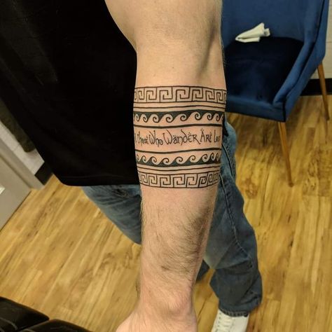 Black and White tattoos, band tattoos, tribal tattoos, men's forearm tattoo, LOTRs, "not all those who wander are lost" Hawaii Tattoo Men, Tattoos Band, Feather Tat, Black And White Tattoos, Lost Tattoo, Hawaii Tattoo, Simple Tats, Tattoo Band, Hawaii Tattoos