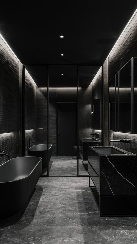 Discover the allure of an elegantly designed bathroom that exudes sophistication and tranquility. With its sleek matte black finishes, this luxurious space combines modern aesthetics with a timeless charm. From the stunning fixtures to the soft ambient lighting, every detail is meticulously crafted to transform your daily routine into a spa-like experience. Get inspired to create your own oasis of relaxation and style! ✨🖤 Luxurious Black Bathroom, Black House Bathroom, Black Houses Interior, All Black House Interiors, All Black Houses, All Black Home, Villains Lair, All Black Interior, Dark Houses