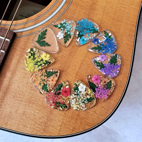 Custom Resin Flower Guitar Pick Resin Guitar, Flower Guitar, Cool Guitar Picks, Epoxy Ideas, Desain Buklet, Guitar Obsession, Fern Leaves, Flower Resin, Birthday List