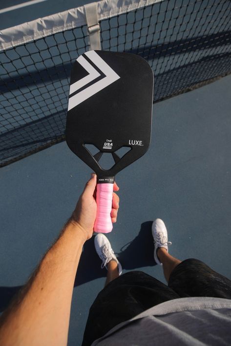 USA Pickleball Approved. Lightweight and open-throat design for quicker hands at the net! Thickness: 13mm Weight: 7.4 OZ Foam-filled edges to increase the sweet spot Textured carbon fiber surface for enhanced control Open Throat Design for better air resistance and quicker hands Thermoformed - stronger unibody paddle ** Disclaimer hitting the paddle on the ground can cause the edge of the paddle to chip a bit. We STRONGLY recommend getting edge guard tape to protect the edge. Tennis Event, Edge Guard, Tennis Shorts, Sports Complex, Tennis Fashion, Tennis Racquet, Pickleball Paddles, Pink And Gray, Paddles