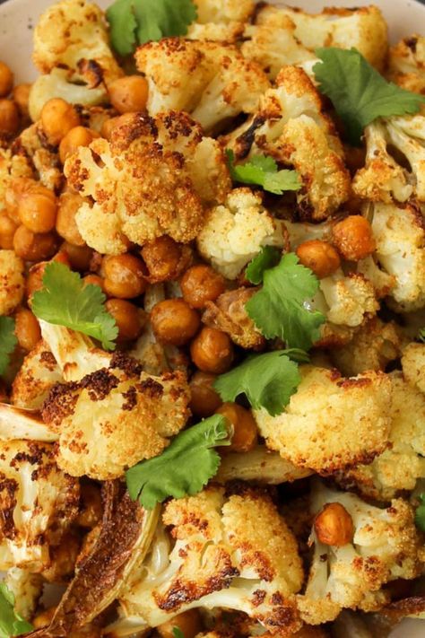 Oven-roasted cauliflower on plate with fresh cilantro and chickpeas Pork Tenderloin Side Dishes, Cauliflower In Oven, Pork Tenderloin Sides, Homemade Mac And Cheese Recipe Baked, Cumin Recipes, Easy Pork Tenderloin, Easy Cucumber Salad, Lunch Invitation, Oven Roasted Cauliflower