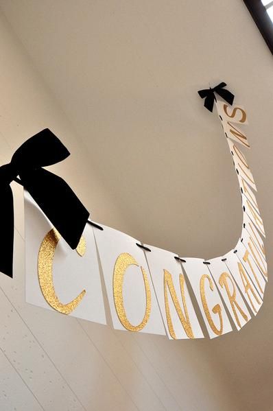 This Confetti Momma "Graduation Banner" is so irresistible. It can be such a chic party focal point for your graduation party. You could hang one on your mantle, drape one behind the snack table, or use it as a party photo prop!This banner was designed using sophisticated glitter gold font, white card stock tiles, and Party Graduation Decorations, Congratulations Graduation, Anniversaire Diy, College Graduation Parties, Graduation Signs, Party Tips, High School Graduation Party, Graduation Banner, Snack Table