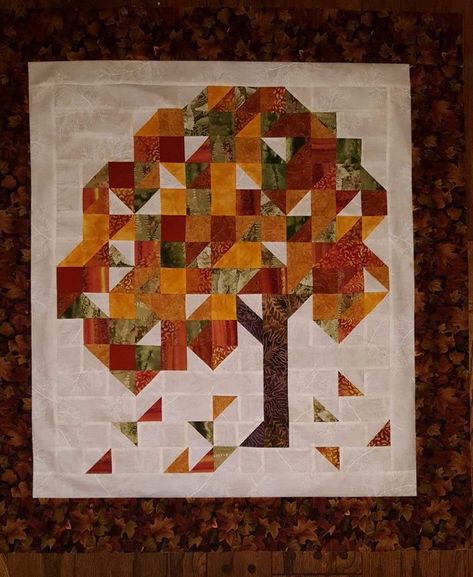 Pin by Jeanne Culver on Quilts in 2022 | Fall quilt patterns, Fall quilts, Quilt patterns Autumn Quilted Wall Hangings, Fall Tree Quilt Pattern, Fall Quilts Wall Hangings, Seasonal Quilted Wall Hanging Patterns, Fall Quilts Ideas, Tree Barn Quilt Patterns, Fall Color Quilts, Thanksgiving Quilt Blocks, Fall Quilt Patterns Autumn