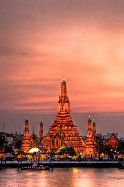 Wat Arun at Sunset, Bangkok, Thailand.   Go to www.YourTravelVideos.com or just click on photo for home videos and much more on sites like this. Jigsaw Pictures, Traveling Asia, Bangkok Travel Guide, Thailand Wallpaper, Wat Arun, Ao Nang, Bangkok Travel, Phuket Thailand, Krabi