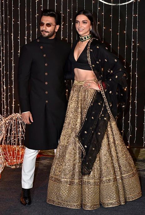 Gold Lehengas Bridal wear Bridal lehenga Bridal design Bridal look Bridal ideas Bridal golden lehenga reception wear Celebrity wedding Celebrity couple indian wedding wedding wear bridal dressing ideas bridal dressing wedding ideas Bridal outfit Indian weddings Indian wedding concepts Wedding concepts Black And Gold Lehenga, Diwali Fashion, Golden Lehenga, Reception Outfit, Sabyasachi Lehenga, Black Lehenga, Indian Outfits Lehenga, Traditional Indian Outfits, Indian Bridal Dress